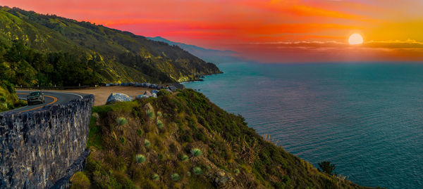 Scenic view of sea against sky during sunset