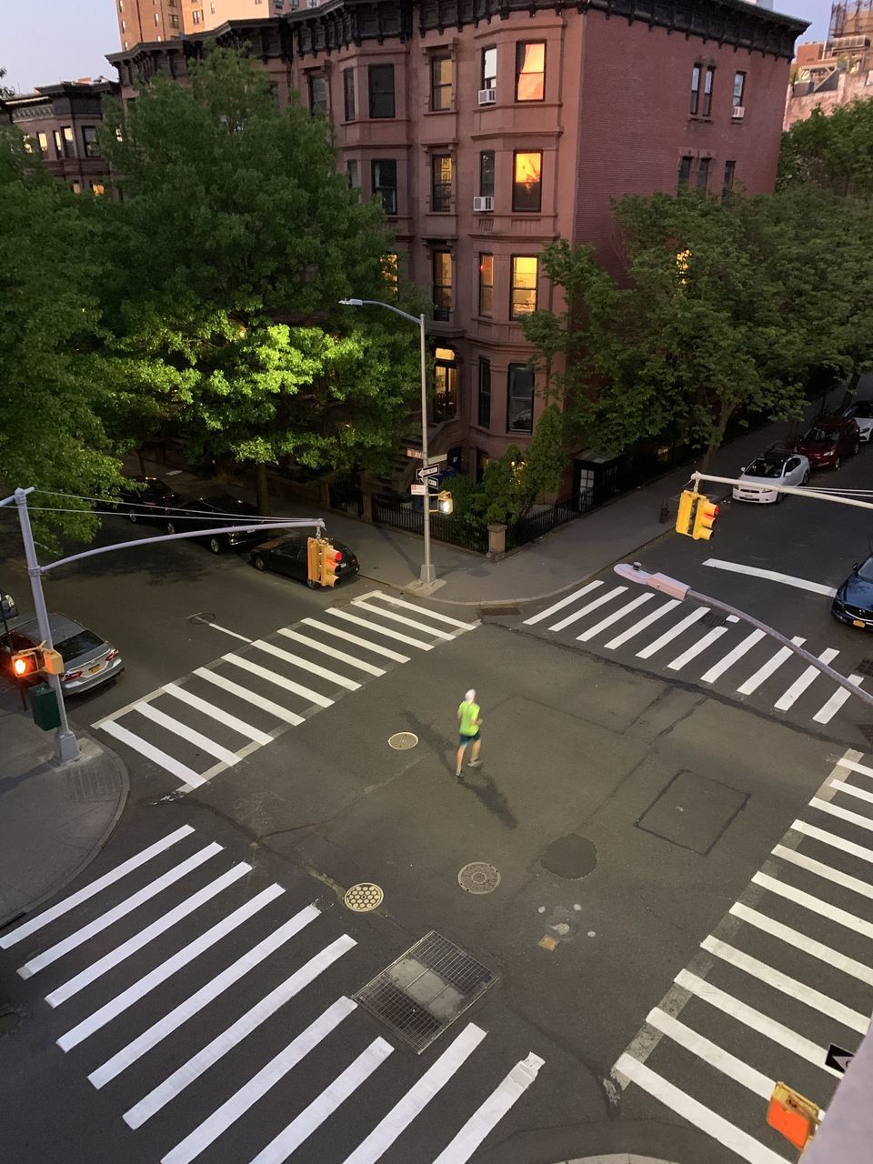 HIGH ANGLE VIEW OF ROAD CROSSING SIGN