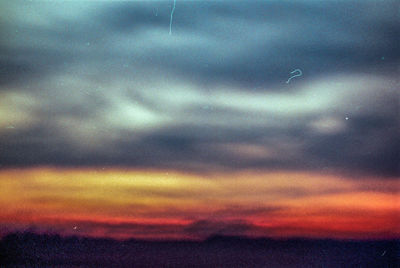 Scenic view of dramatic sky during sunset