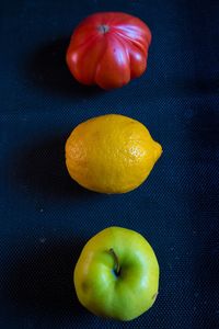 Close-up of fruit over white background