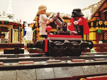 Close-up of toys with toy standing on table