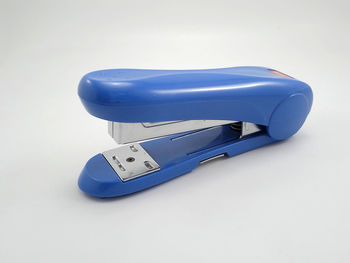 High angle view of smart phone against white background