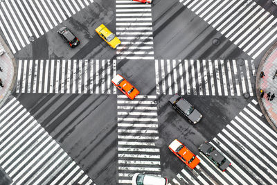 High angle view of crossing sign on road