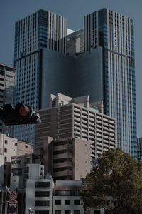 Low angle view of modern buildings in city