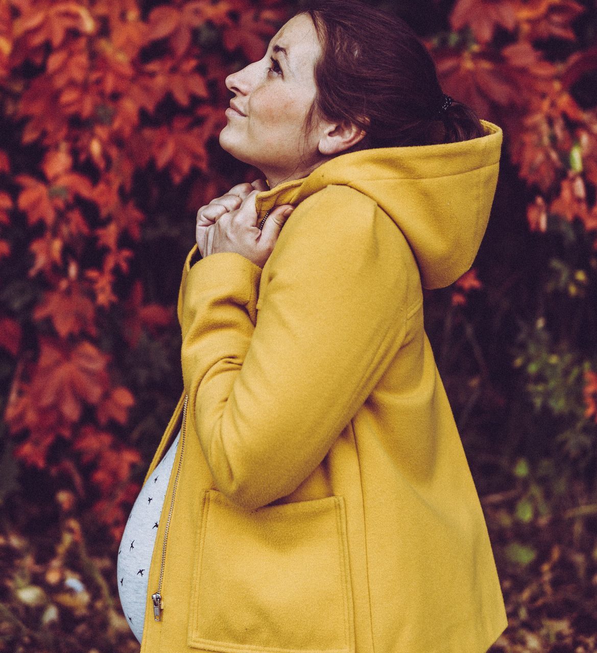 autumn, leaf, one person, real people, lifestyles, outdoors, jacket, embracing, women, yellow, standing, day, nature, young women, warm clothing, young adult, adult, people