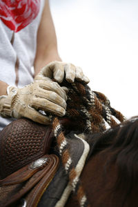 Close-up of man working in rope