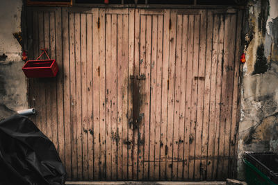 Closed wooden door of building