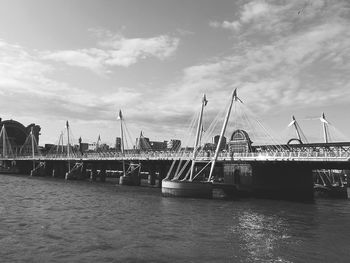 View of bridge over river thames in london against sky