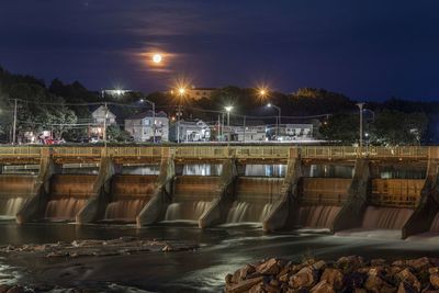 Moon rise on dam, matane, quebec