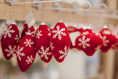 Close-up of christmas decorations hanging in market