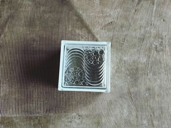 High angle view of old machine on table