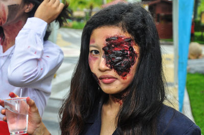 Close-up portrait of young woman