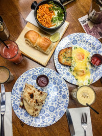High angle view of breakfast served on table