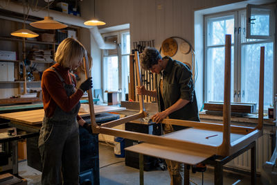 Side view of man working at home