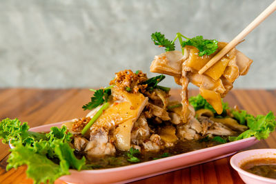 Close-up of food served on table