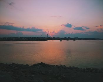 Scenic view of sea at sunset
