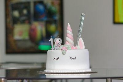 Close-up of birthday cake on table at home