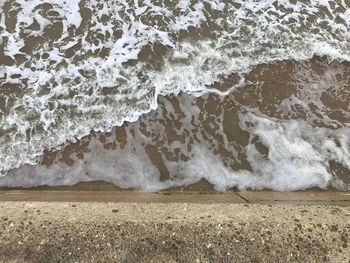 Close-up of sand at beach