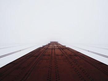 Low angle view of bridge against clear sky