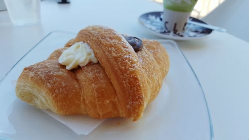 Close-up of bread served in plate on table