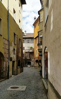 Narrow alley along buildings