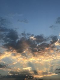 Low angle view of clouds in sky during sunset