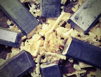 High angle view of logs on wood