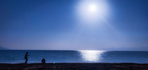 Scenic view of sea against sky at sunset