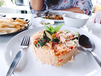 Fried rice with tom yum seafood