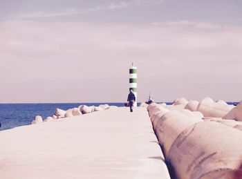 Scenic view of sea against sky during winter