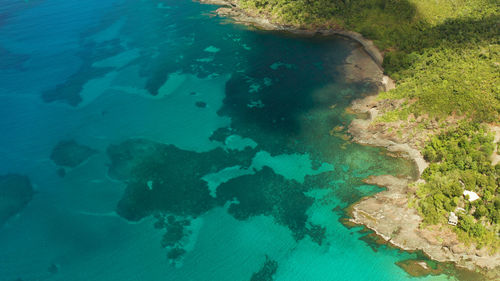 Aerial view turquoise water in the lagoon and coral reef. palawan, philippines. 