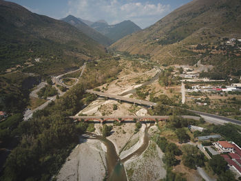 High angle view of road amidst mountains against sky