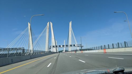 View of bridge over road against sky