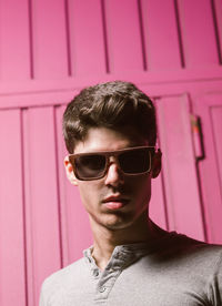 Portrait of young man wearing sunglasses