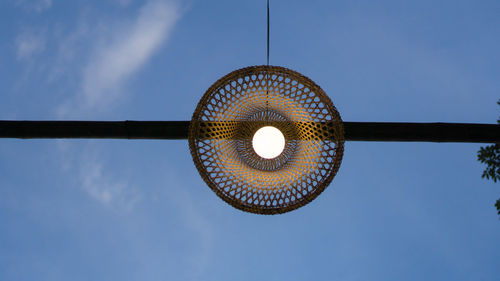 Low angle view of illuminated light against sky