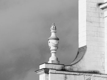 Low angle view of statue against building