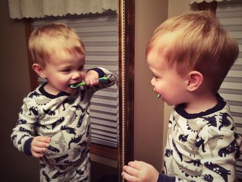 Boy brushing his teeth