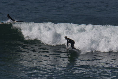 Man surfing in sea