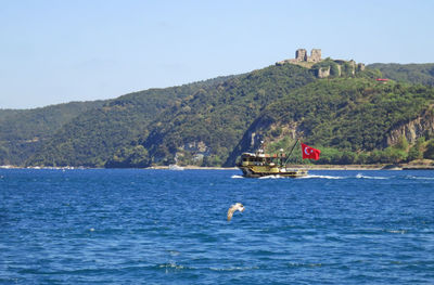 People on boat in sea