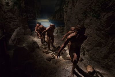 Group of people on rock formation