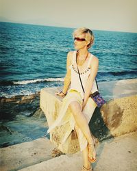 Woman standing on beach