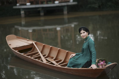 Woman sitting in a boat