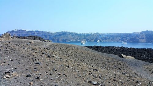 Scenic view of beach against clear sky