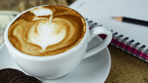 High angle view of cappuccino on table