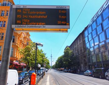 Road sign against clear sky