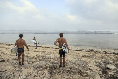 Surfers at the beach