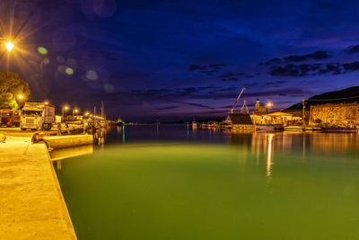 Illuminated buildings at waterfront