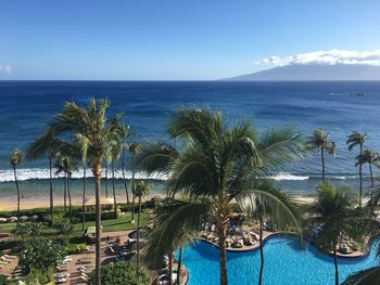 Scenic view of sea against blue sky