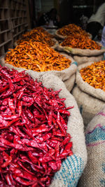 Close-up of red chili peppers at market