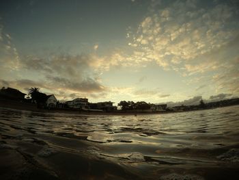 Scenic view of sea against cloudy sky